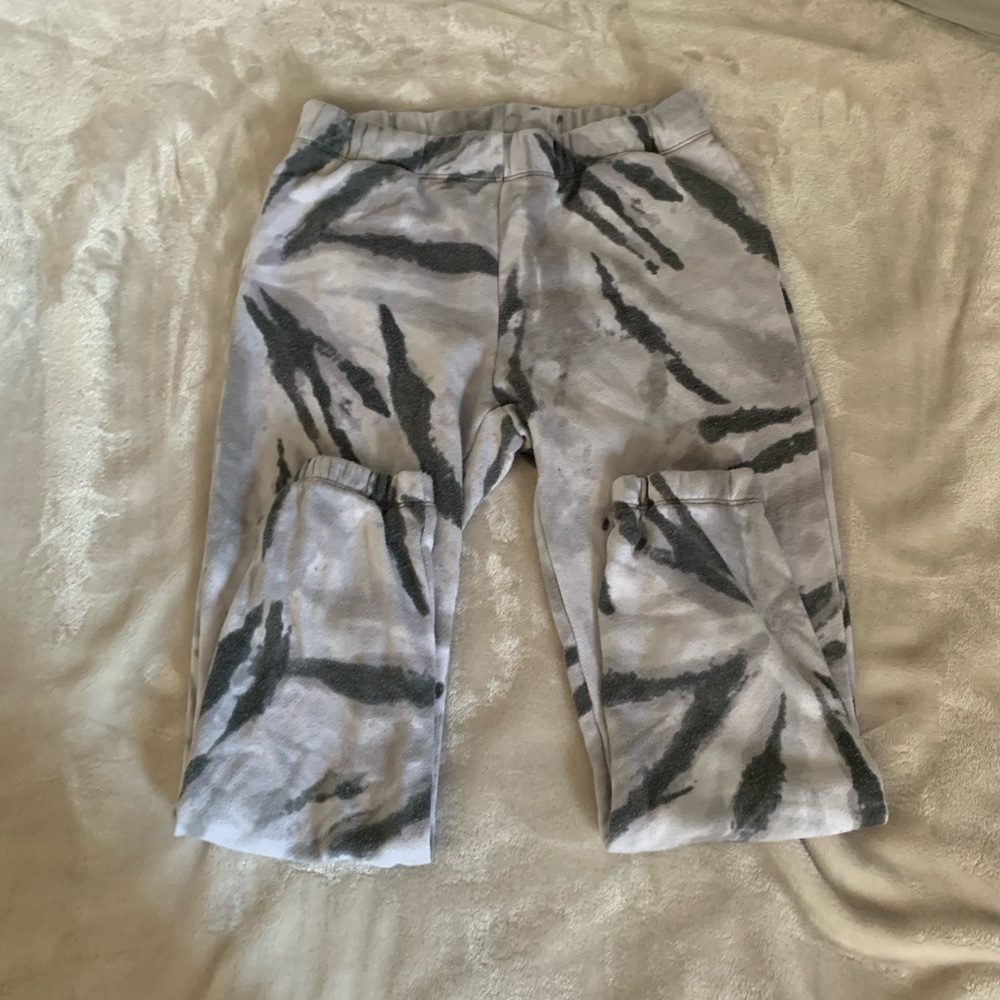 Three pairs of sweat pants.